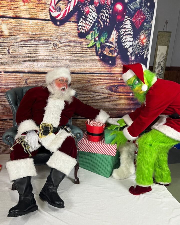 A real-bearded Santa will protect your holiday presents from the Grinch.